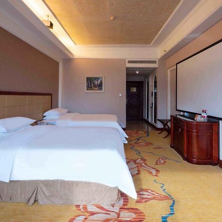 Vienna Hotel Shenzhen Songgang Liye Road Bagian luar foto