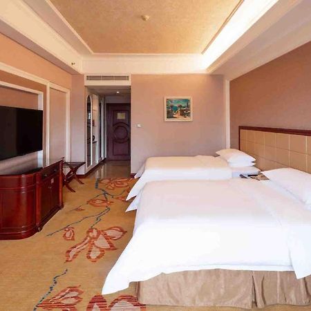 Vienna Hotel Shenzhen Songgang Liye Road Bagian luar foto