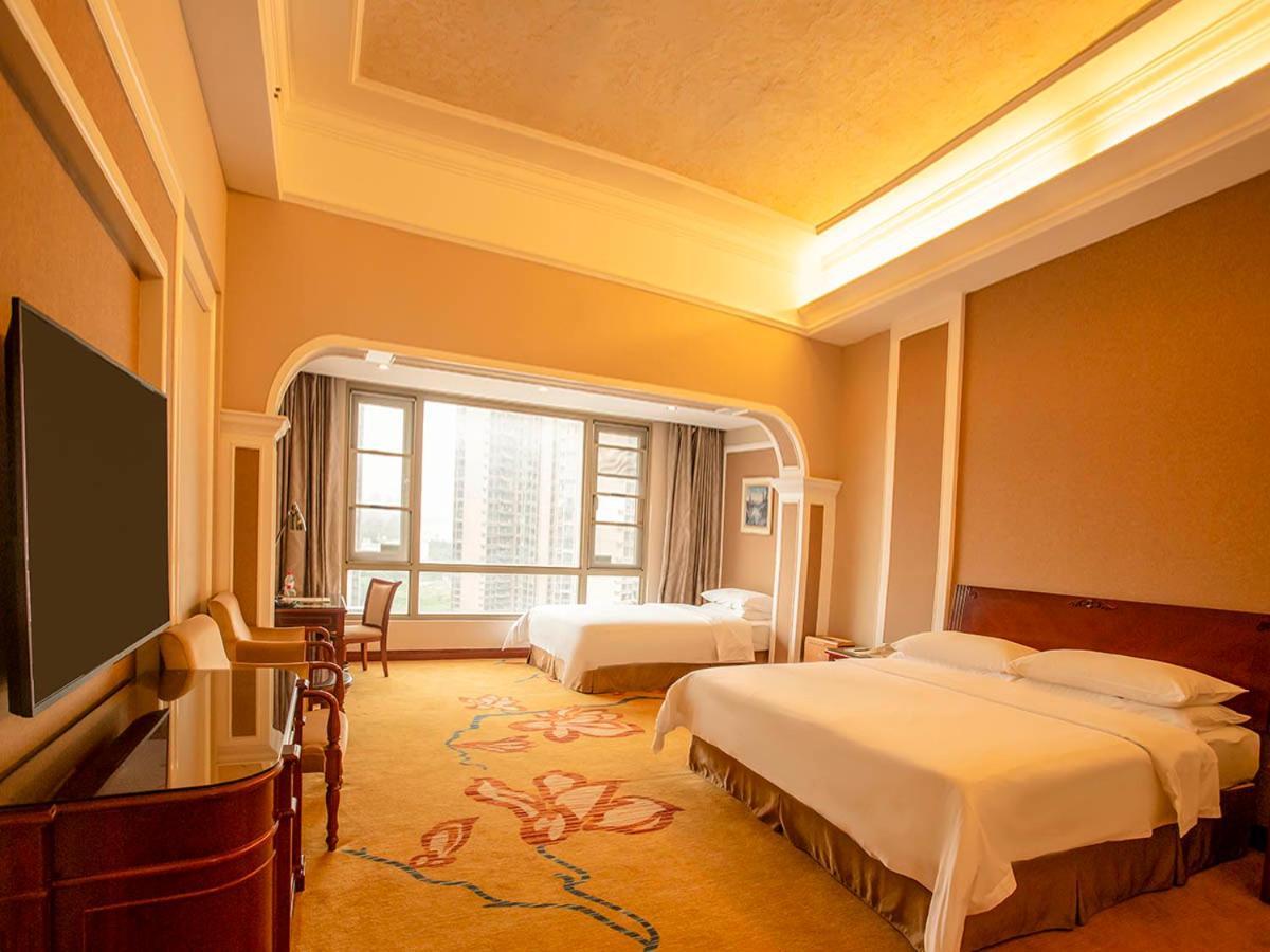 Vienna Hotel Shenzhen Songgang Liye Road Bagian luar foto