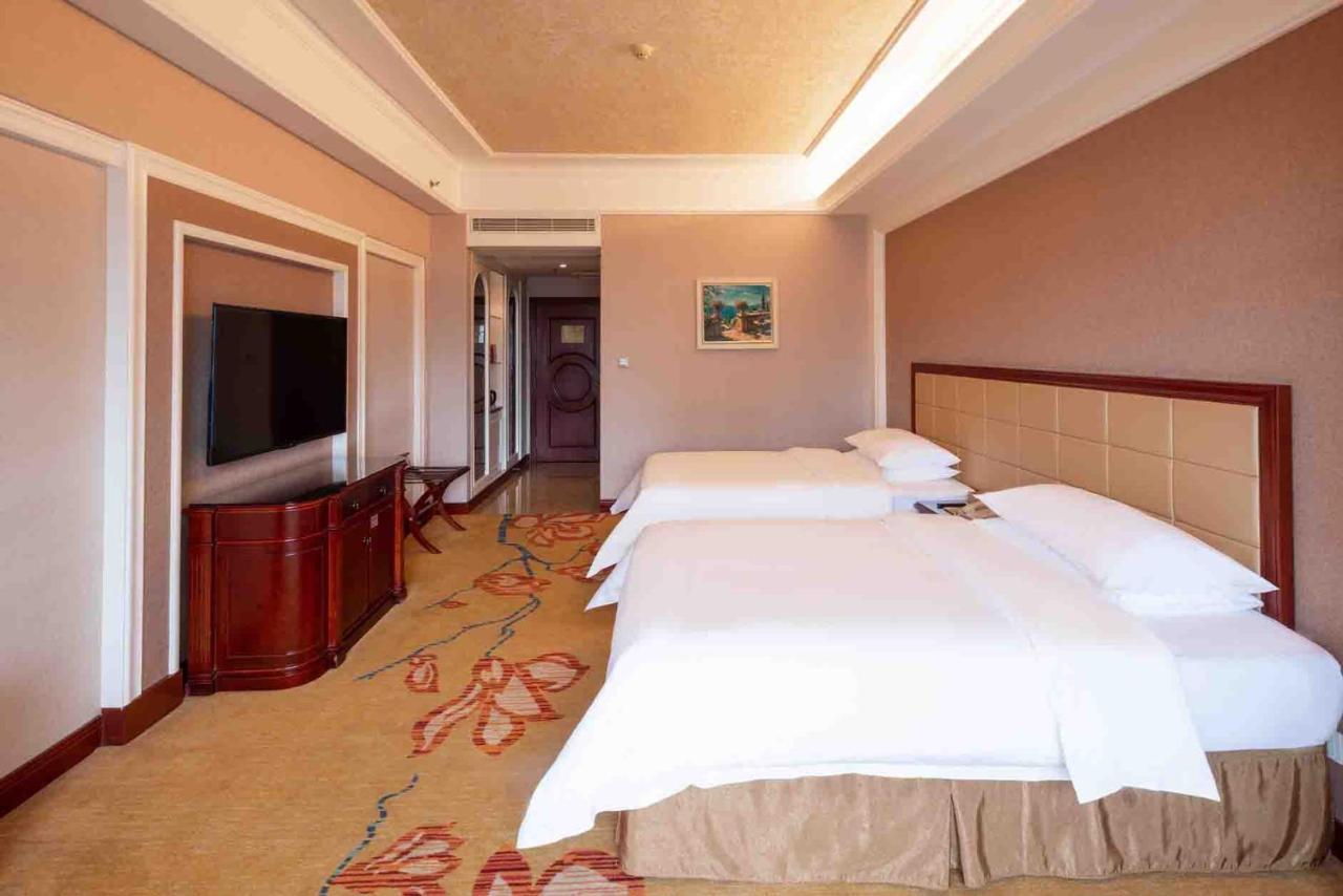 Vienna Hotel Shenzhen Songgang Liye Road Bagian luar foto